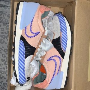 A pair of brand new, never worn NIKE daybreak type “ N.354” shoes . Size 6.5